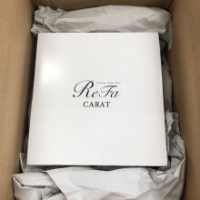 リファの安全な梱包方法の見本_その上に商品を並べて隙間を残りの新聞又は古紙
で埋める